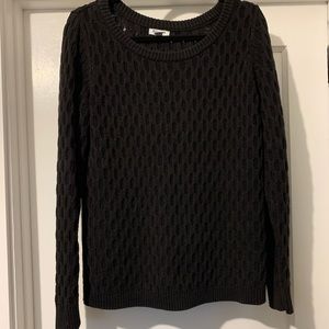 Black sweater with honeycomb pattern